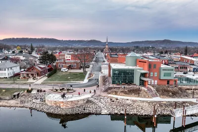 Discover the charming winter landscape of Wabasha, Minnesota, showcasing the National Eagle Center and townscape.